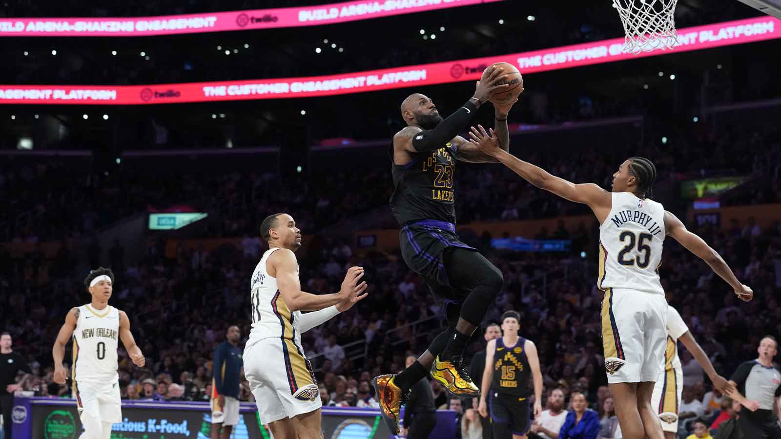 Los Angeles Lakers forward LeBron James (23) shoots the ball against New Orleans Pelicans forward Trey Murphy III (25) in the second half at Crypto.com Arena.