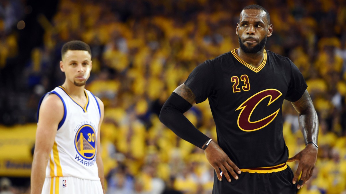 Cleveland Cavaliers forward LeBron James (23) and Golden State Warriors guard Stephen Curry (30) during the third quarter in game five of the NBA Finals at Oracle Arena.