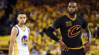Cleveland Cavaliers forward LeBron James (23) and Golden State Warriors guard Stephen Curry (30) during the third quarter in game five of the NBA Finals at Oracle Arena.