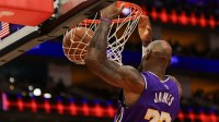 Los Angeles Lakers forward LeBron James (23) dunks against the Houston Rockets in the second half at Toyota Center.