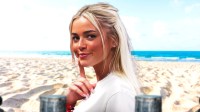 Baywatch reboot series star Olivia Livvy Dunne, who posted a picture of herself in the iconic red swimsuit, with a beach in the background.