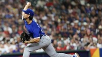 Italy starting pitcher Michael Lorenzen (24) pitches against United States in the first inning at Daikin Park
