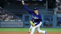 Los Angeles Dodgers pitcher Roki Sasaki (11) pitches during the fourth inning against the Los Angeles Angels at Dodger Stadium.