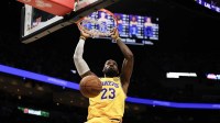 Los Angeles Lakers forward LeBron James (23) dunks against the Miami Heat during the first half at Kaseya Center. Mandatory Credit: Isabella Frias-Imagn Images