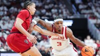 Louisville Cardinals guard Ryan Conwell (3) drives past NC State Wolfpack guard Matt Able (3) during the Cards win over the Wolfpack 118-77 at the KFC Yum! Center in downtown Louisville February 9, 2026. Conwell finished with 31 points.