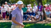 Ludvig Aberg acknowledges the crowd after he chipped in for eagle on the ninth green during the second round of THE PLAYERS Championship golf tournament.