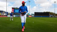 New York Mets outfielder Luis Robert Jr. (88) looks on from the field during spring trining at Clover Park.
