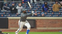 New York Mets center fielder Luis Robert Jr. (88) hits a three run walk off home run against the Pittsburgh Pirates during the eleventh inning at Citi Field.