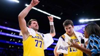 Los Angeles Lakers guard Luka Doncic (77) gestures after scoring a game winning shot during overtime against the Denver Nuggets at Crypto.com Arena. Mandatory Credit: William Liang-Imagn Images