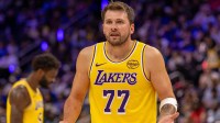 Los Angeles Lakers Luka Doncic (77) reacts to a play against the Detroit Pistons during the second half at Little Caesars Arena.