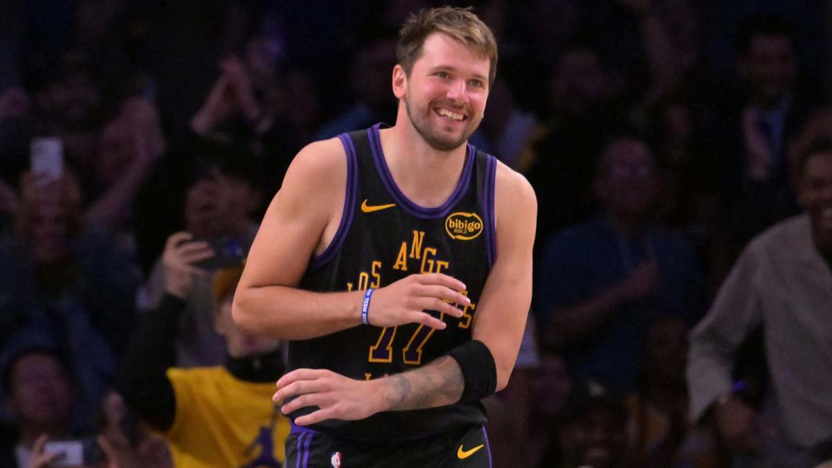 Los Angeles Lakers guard Luka Doncic (77) smiles after a dunk in the final minutes of the game against the Cleveland Cavaliers at Crypto.com Arena.