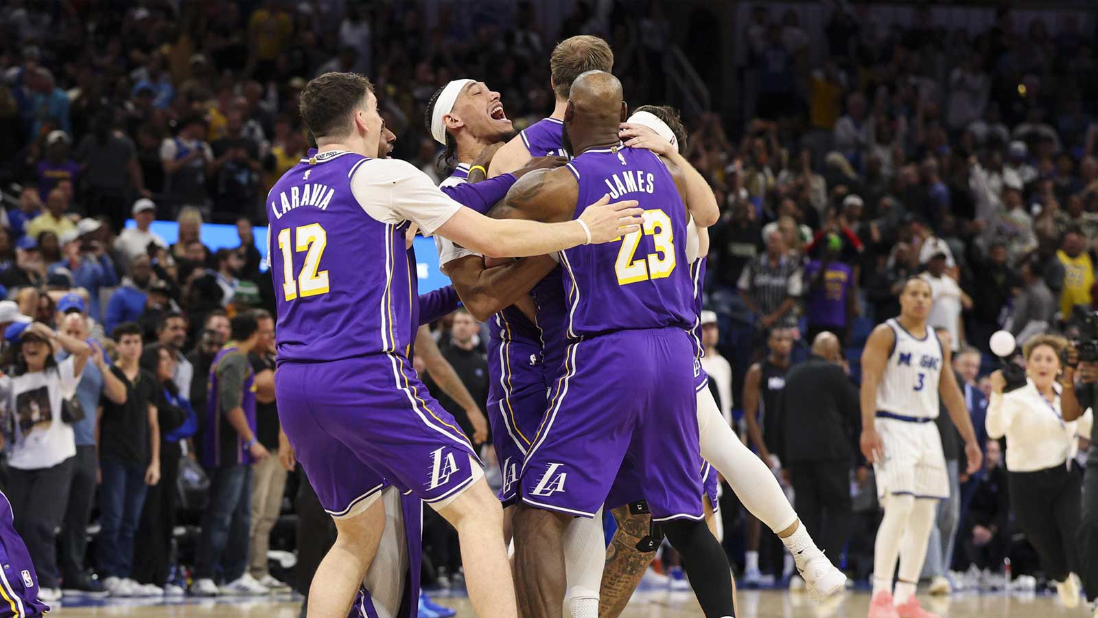 Dallas Mavericks forward Naji Marshall (13) shoots over LA Clippers guard Darius Garland (10) during the first quarter at the American Airlines Center.