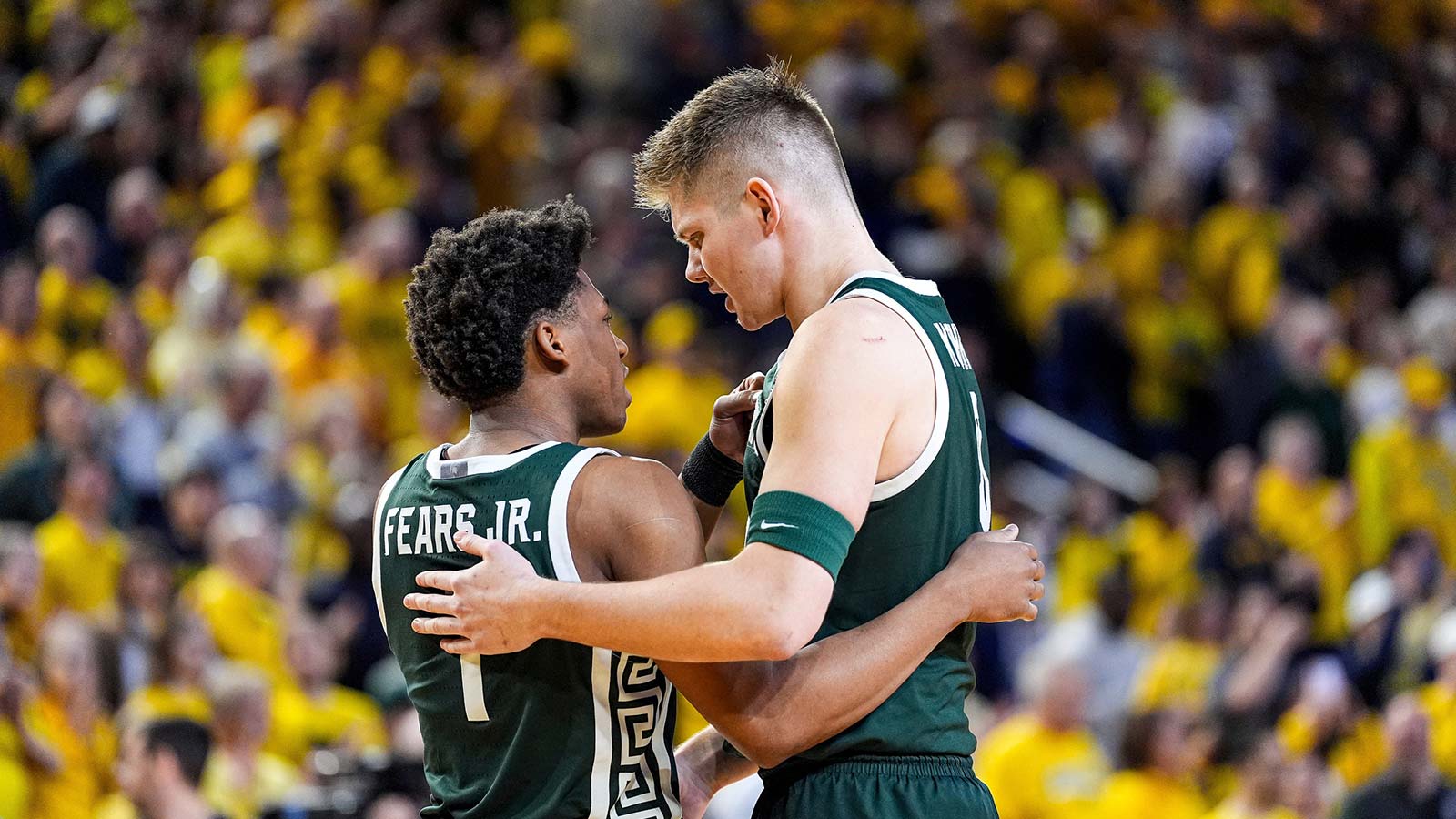 Michigan State guard Jeremy Fears Jr. (1) talks to forward Jaxon Kohler (0) before tip-off against Michigan during the first half at Crisler Center in Ann Arbor on Sunday, March 8, 2026