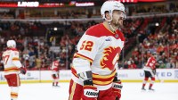 Jan 15, 2026; Chicago, Illinois, USA; Calgary Flames defenseman MacKenzie Weegar (52) reacts during the first period at United Center.