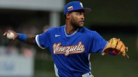 Venezuela third baseman Maikel Garcia (23) makes a throw to first base for an out against the United States in the seventh inning during the 2026 World Baseball Classic Championship game at loanDepot Park.