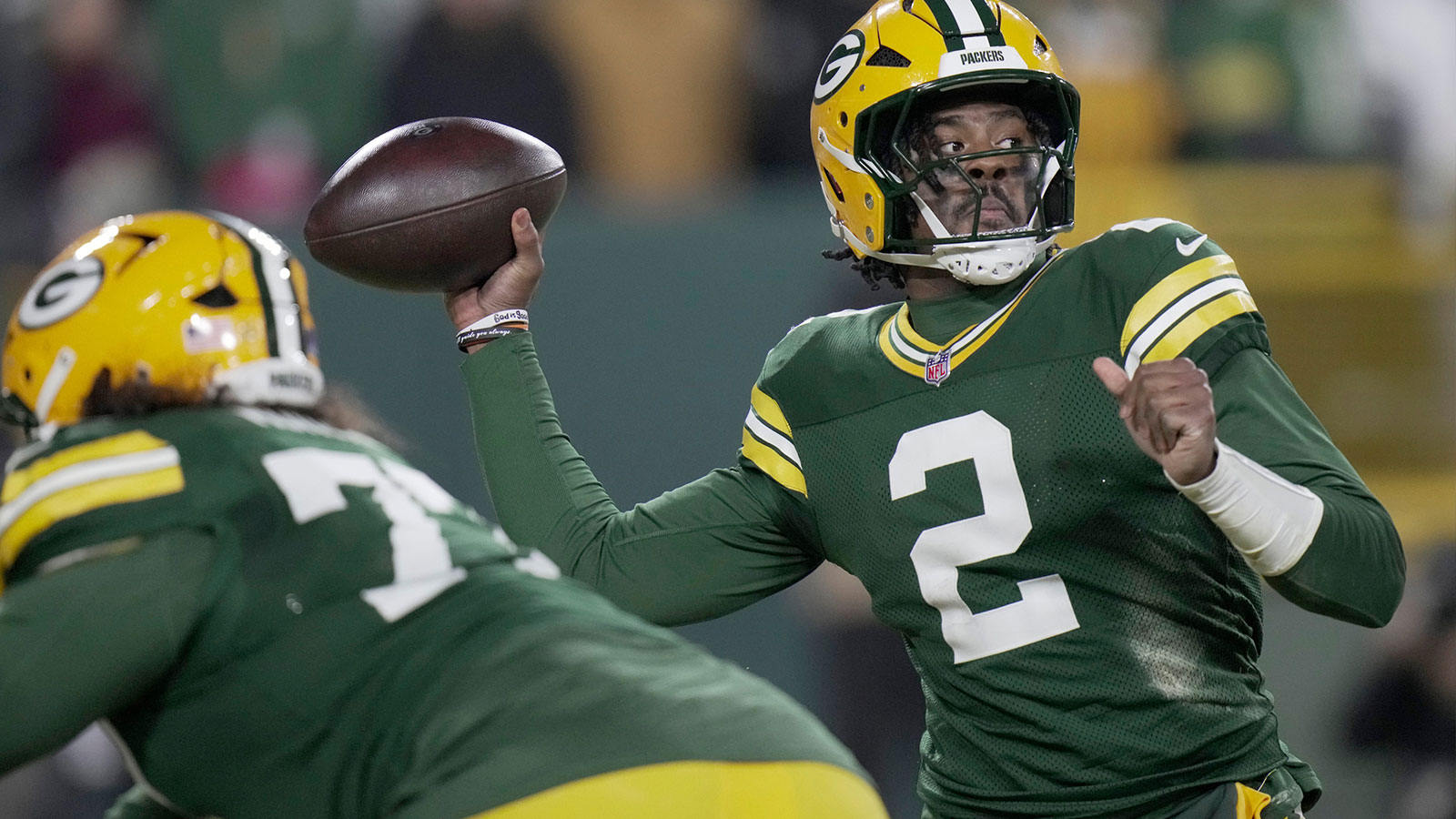 Green Bay Packers quarterback Malik Willis (2) throws during the third quarter of their game against the Baltimore Ravens Saturday, December 27, 2025 at Lambeau Field in Green Bay, Wisconsin.