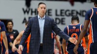 Auburn Tigers head coach Steven Pearl cheer on his players during the first half against the Alabama Crimson Tide at Coleman Coliseum.