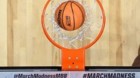 A general overall view of a Wilson Evo NXT basketball with the March Madness logo goes through the net during a first round game of the men's 2026 NCAA Tournament at Viejas Arena.