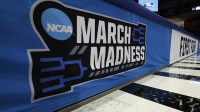Detailed viewed of March Madness logo during a practice session ahead of the first four of the men's 2026 NCAA Tournament at University of Dayton Arena.