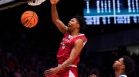 Miami (OH) RedHawks wing Eian Elmer (0) dunks the ball in the second half of the NCAA Tournament First Four game between the Miami Redhawks and Southern Methodist University Mustangs, Wednesday, March 18, 2026, at University of Dayton Arena in Dayton, Oh. RedHawks won 89-79.