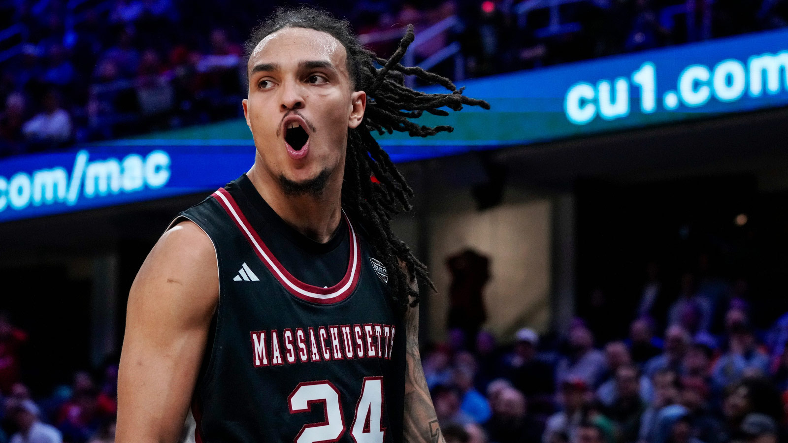 UMass Minutemen guard Marcus Banks (24) cheers as he is sent to the free throw line in the final seconds of the second half of Mid-American Conference Tournament first round game between the Miami RedHawks and the UMass Minutemen at Rocket Arena in Cleveland on Thursday, March 12, 2026. Top-seeded Miami was eliminated from the tournament with an 87-82 loss to the Minutemen.