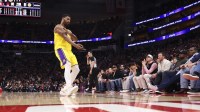 Los Angeles Lakers guard Marcus Smart (36) celebrates after scoring a three-point basket during the fourth quarter against the Houston Rockets at Toyota Center.