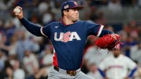 United States pitcher Mason Miller (19) delivers a pitch in the ninth inning against the Dominican Republic during a semifinal game of the 2026 World Baseball Classic at loanDepot Park.