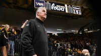Purdue Boilermakers head coach Matt Painter walks onto the court before the game against the Iowa Hawkeyes at Carver-Hawkeye Arena.