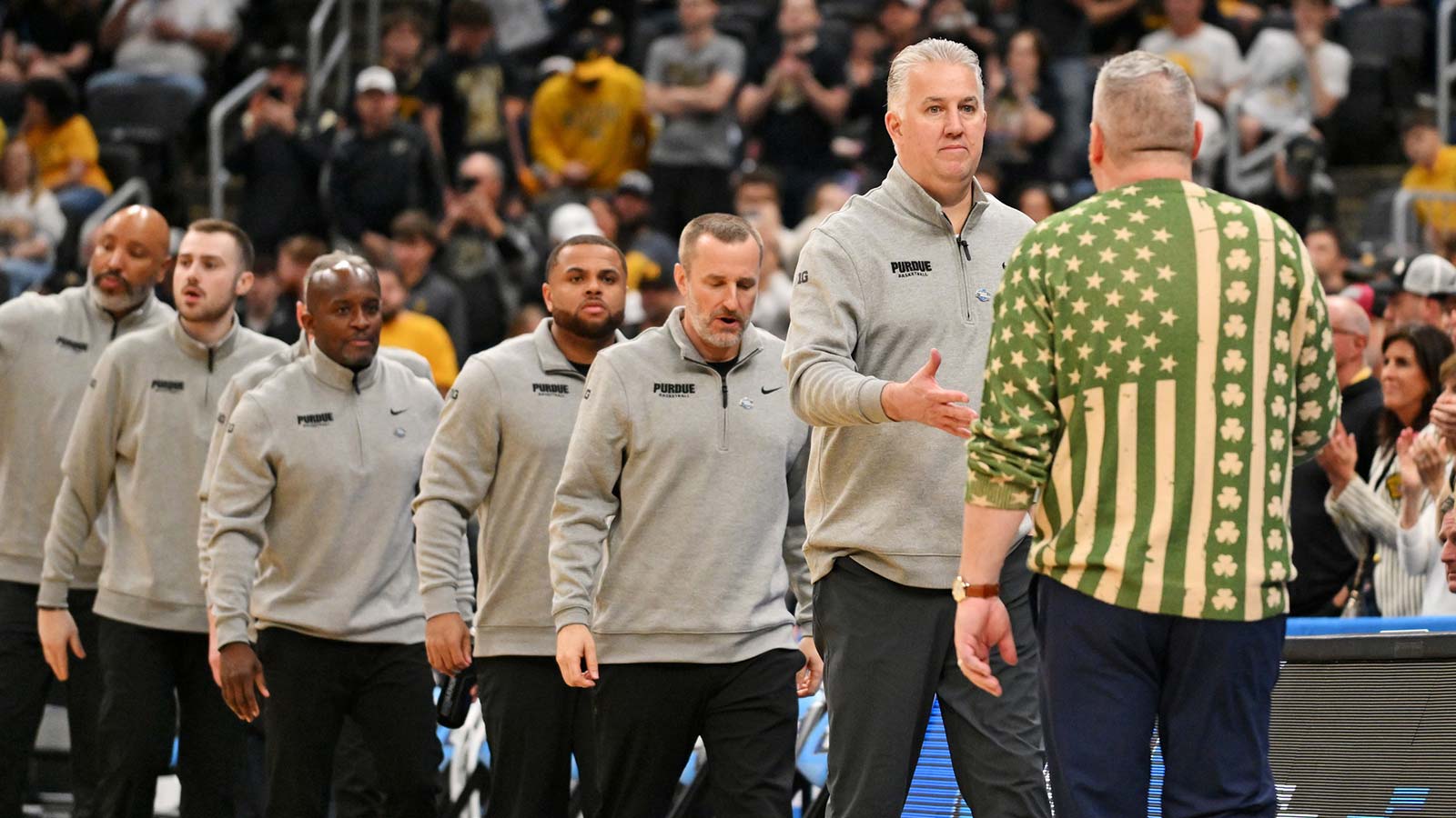 Purdue Boilermakers head coach Matt Painter and Queens University of Charlotte Royals head coach Grant Leonard meet after the game during a first round game of the men's 2026 NCAA Tournament at Enterprise Center.