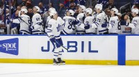 Toronto Maple Leafs forward Matthew Knies (23) celebrates his goal with the bench against the Tampa Bay Lightning during the third period at Benchmark International Arena.