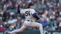 New York Yankees starting pitcher Max Fried (54) throws against the Seattle Mariners during the first inning at T-Mobile Park. Mandatory Credit: John Froschauer-Imagn Images