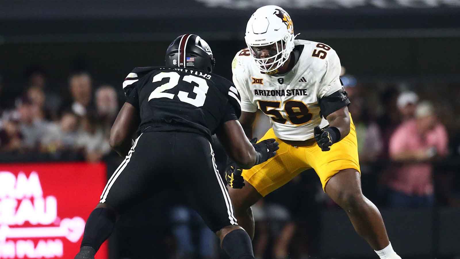 Arizona State Sun Devils offensive lineman Max Iheanachor (58) blocks Mississippi State Bulldogs defensive lineman Trevion Williams (23) during the third quarter at Davis Wade Stadium at Scott Field. 