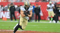 New Orleans Saints tight end Foster Moreau (87) runs for a gain during the second quarter against the Tampa Bay Buccaneers at Raymond James Stadium. Mandatory Credit: Kim Klement Neitzel-Imagn Images