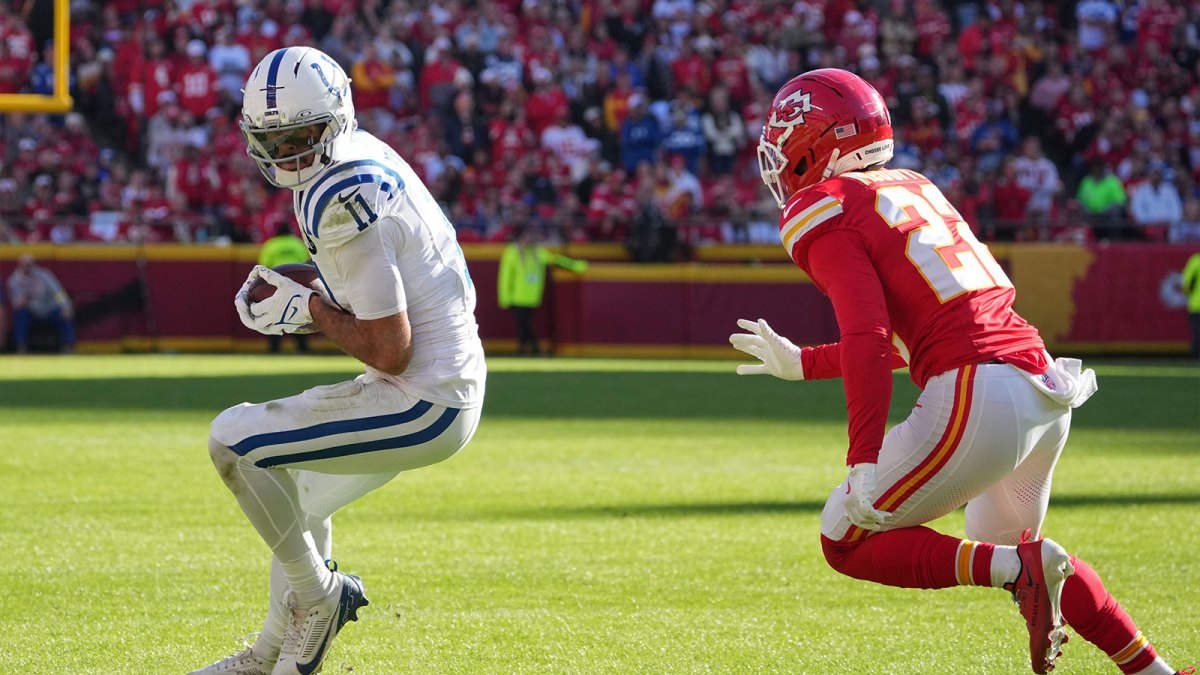 Indianapolis Colts wide receiver Michael Pittman Jr. (11) makes a catch against Kansas City Chiefs cornerback Trent McDuffie (22) in the second half at GEHA Field at Arrowhead Stadium.