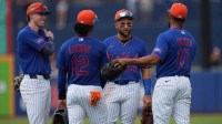 New York Mets third baseman Brett Baty (7), shortstop Francisco Lindor (12), shortstop Bo Bichette (19) and second baseman Marcus Semien (10) gather during a pitching change in the fourth inning against the Toronto Blue Jays at Clover Park.