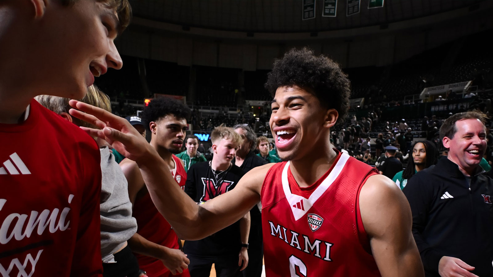 Miami (OH) RedHawks guard Justin Kirby (6) celebrates on the court after defeating the Ohio Bobcats at the Convocation Center.