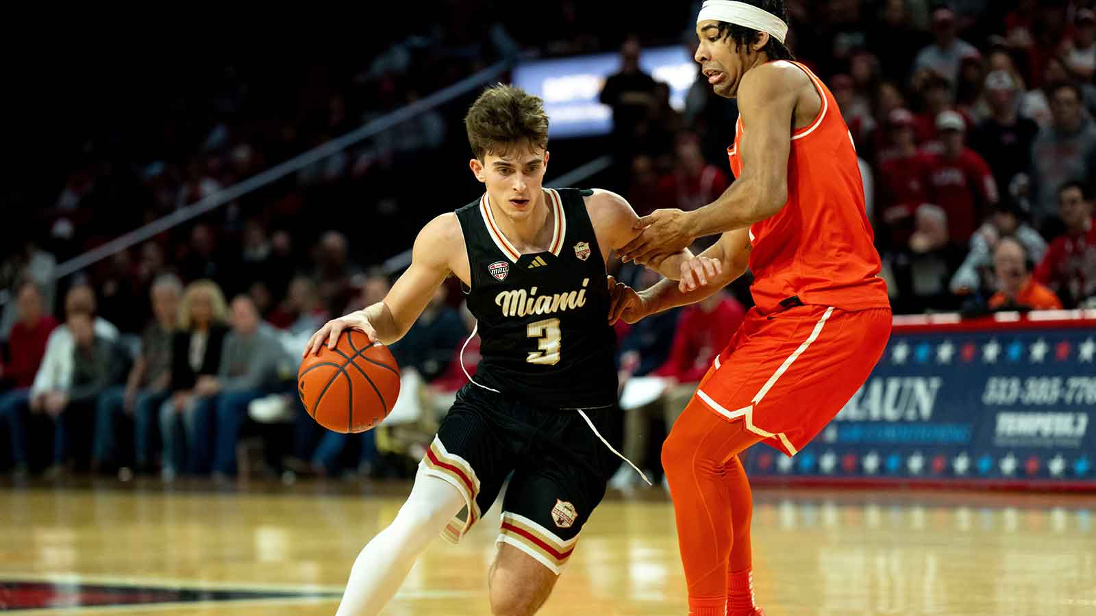 Miami RedHawks guard Luke Skaljac (3) drives on Bowling Green Falcons guard Josiah Shackelford (4) in the second half of the NCAA game on Feb. 20, 2026 at Millett Hall in Oxford, Ohio.