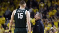 Michigan State Spartans head coach Tom Izzo talks to center Carson Cooper (15) in the second half against the Michigan Wolverines at Crisler Center.