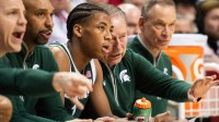 Michigan State Head Coach Tom Izzo talks with Jeremy Fears Jr. (1) during the Indiana versus Michigan State men's basketball game.