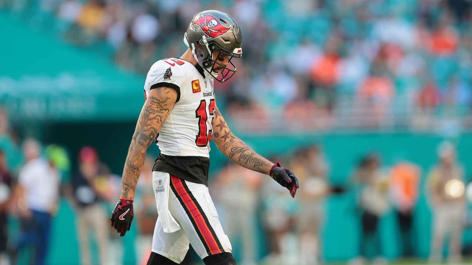 Tampa Bay Buccaneers wide receiver Mike Evans (13) walks on the field during the fourth quarter against the Miami Dolphins at Hard Rock Stadium. 