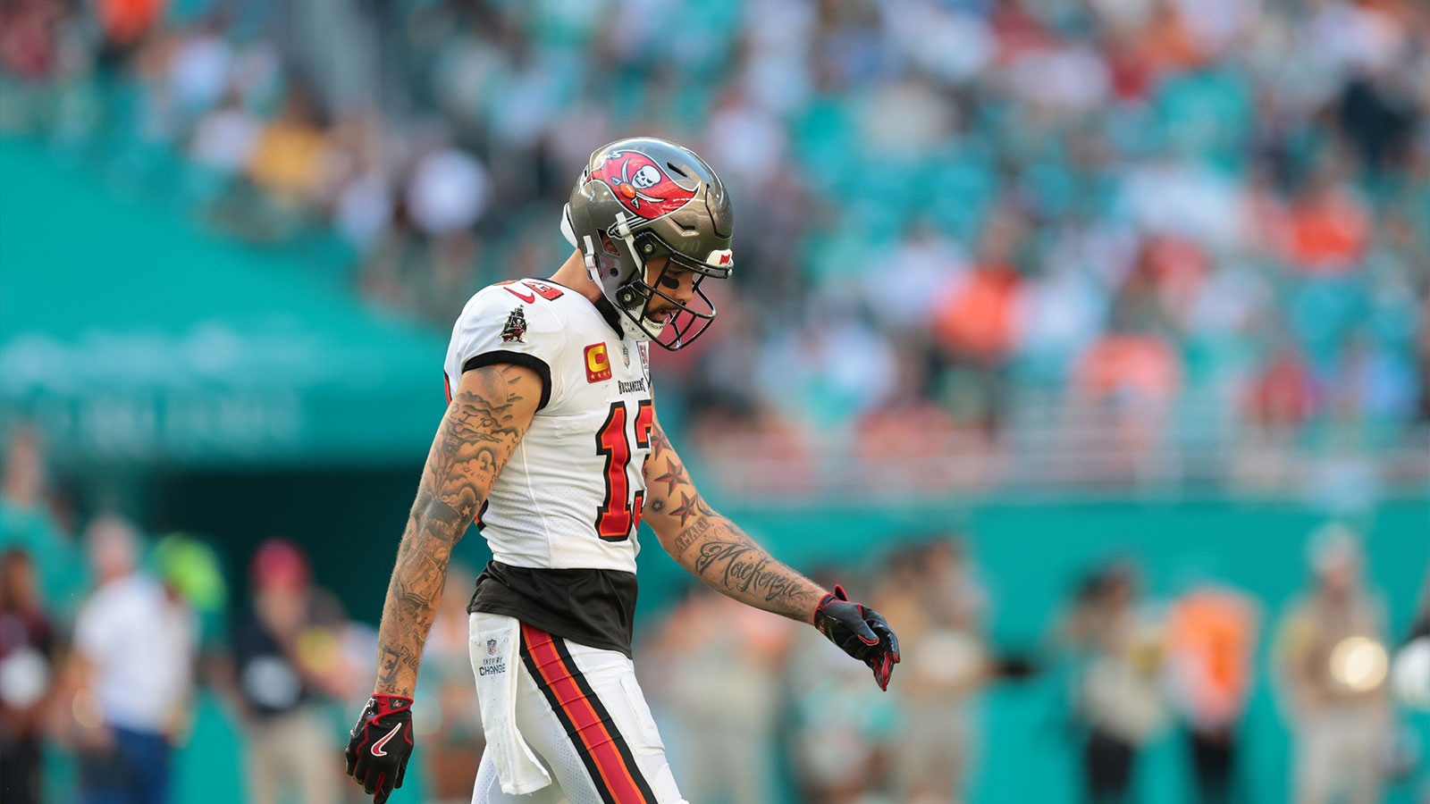 Tampa Bay Buccaneers wide receiver Mike Evans (13) walks on the field during the fourth quarter against the Miami Dolphins at Hard Rock Stadium. 