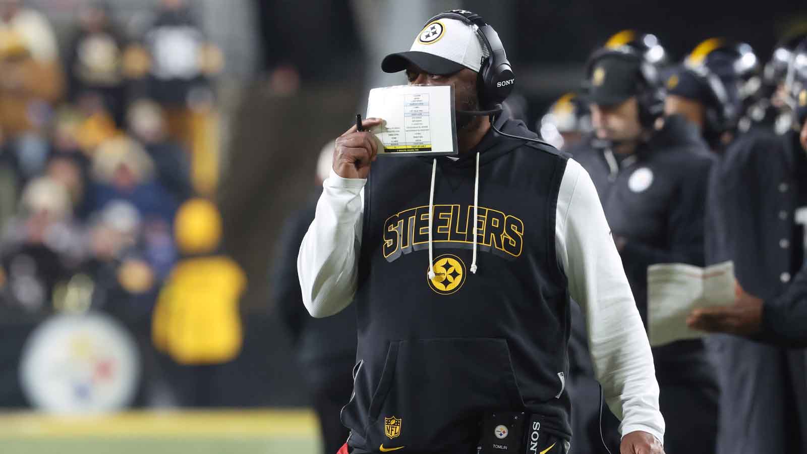 Pittsburgh Steelers head coach Mike Tomlin look on against the Baltimore Ravens during the second quarter at Acrisure Stadium.