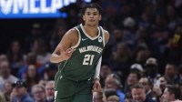 Milwaukee Bucks forward Ousmane Dieng (21) gestures after scoring against the Oklahoma City Thunder during the second half at Paycom Center.