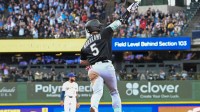 Chicago White Sox first baseman Munetaka Murakami (5) reacts after hitting a solo home run in the second inning against the Milwaukee Brewers at American Family Field.