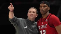 NC State Wolfpack head coach Will Wade with forward Ven-Allen Lubin (22) in the first half at Spectrum Center.