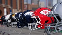 NFL team helmets, including the Las Vegas Raiders, Kansas City Chiefs, Denver Broncos, Tennessee Titans, and Jacksonville Jaguars.