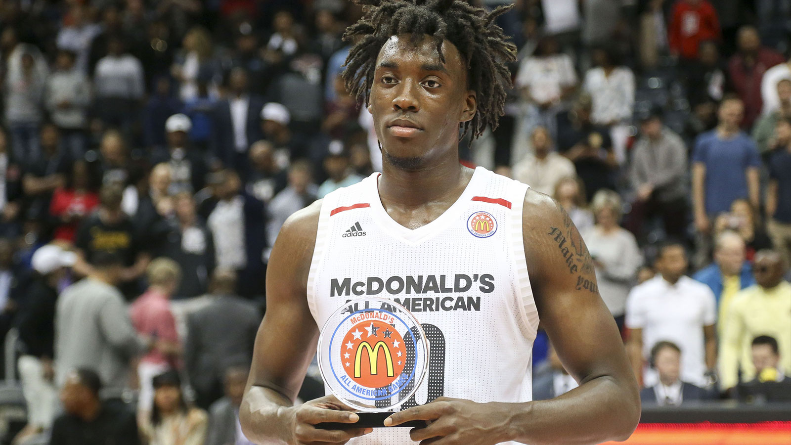 McDonalds All-American West forward Nassir Little (10) holds the most valuable play trophy after the McDonalds High School All American Game at Philips Arena. 
