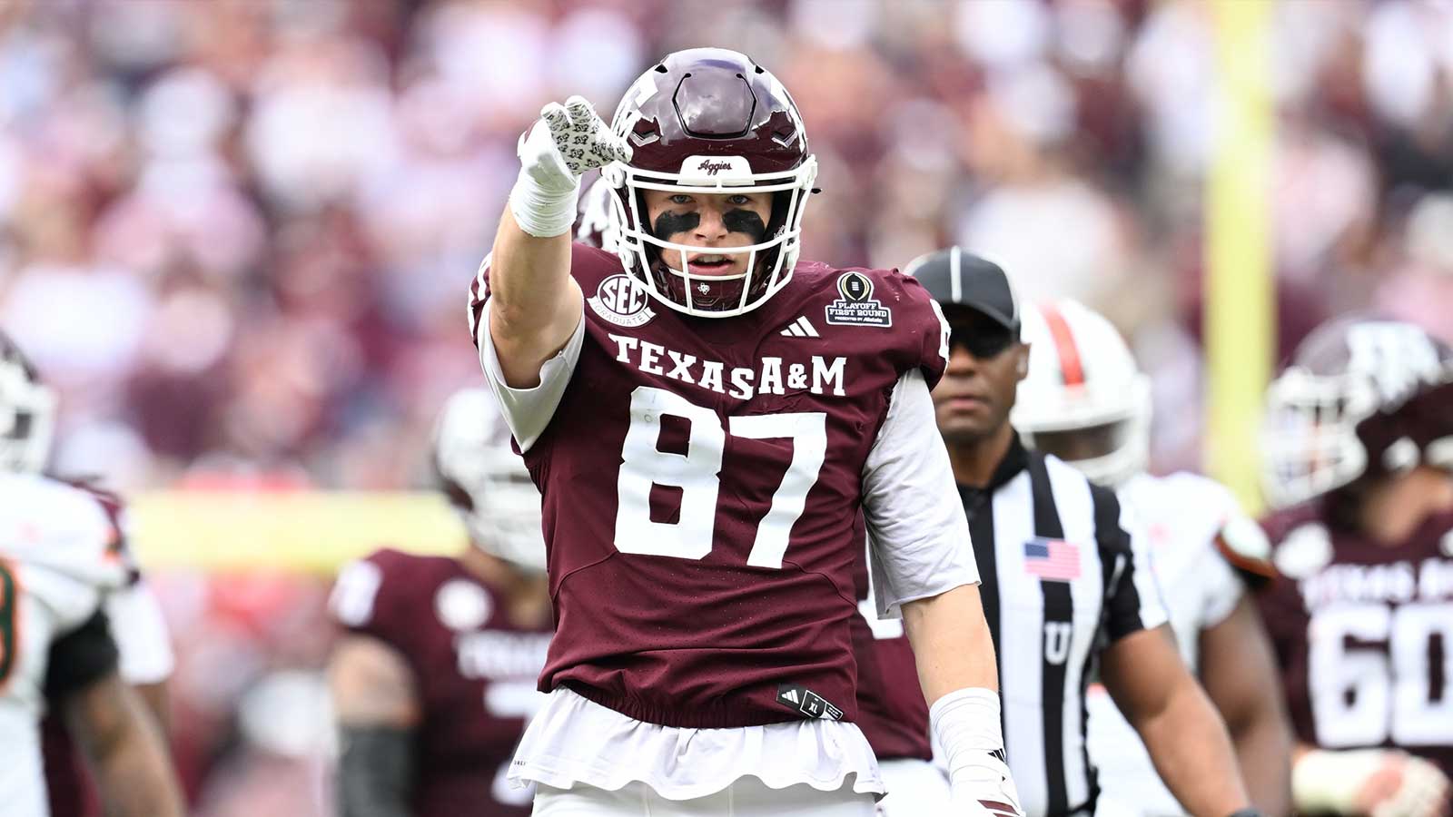 Texas A&M Aggies tight end Nate Boerkircher (87) celebrates a first down against the Miami Hurricanes during first quarter of the first round game of the CFP National Playoff at Kyle Field.