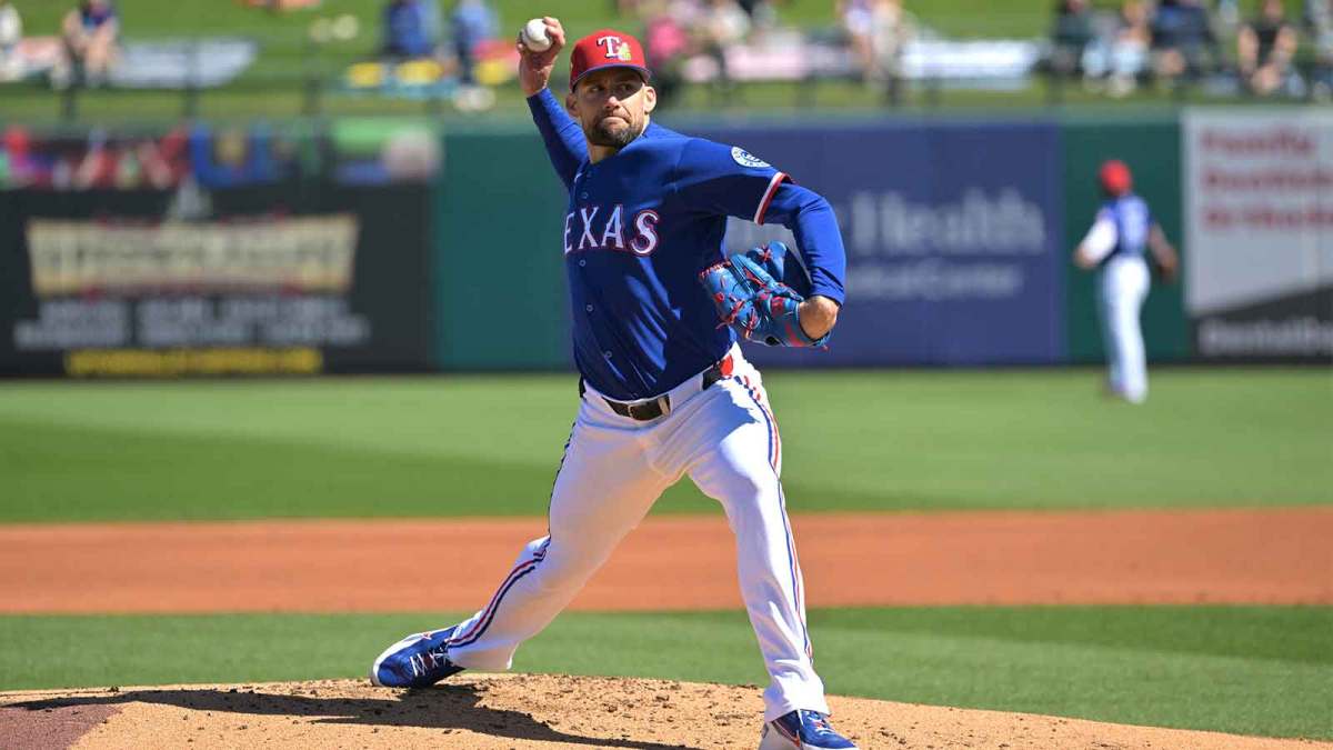 Texas Rangers pitcher Nathan Eovaldi (17) delivers to the plate in the second inning against the Kansas City Royals at Surprise Stadium.