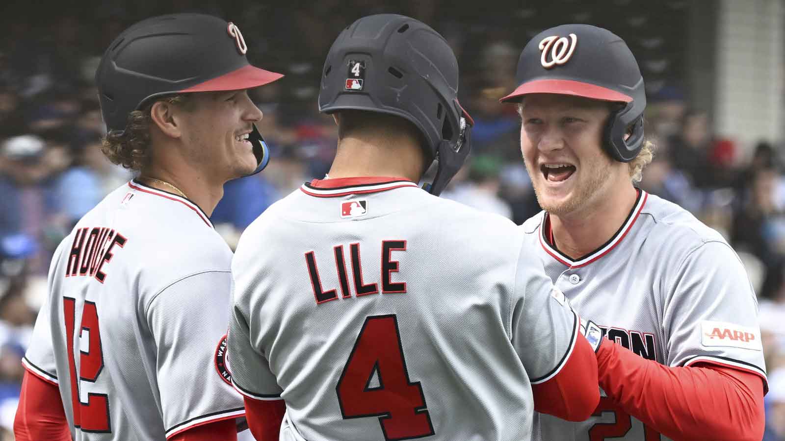 Nationals left fielder Joey Wiemer (21) celebrates with Brady House